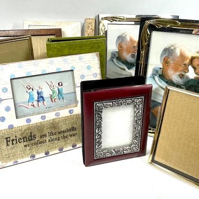 Lot of picture frames and photo books various sizes