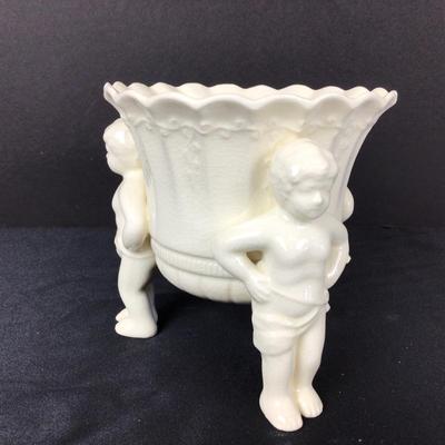 Lot. 6220. Alabaster Vase and Cherub Porcelain Vase