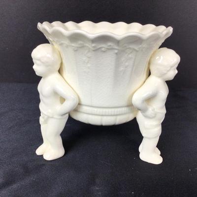 Lot. 6220. Alabaster Vase and Cherub Porcelain Vase