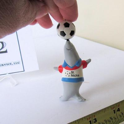 2 Hallmark Christmas Ornaments: Tin Blimp, 1993 and Perfect Balance, 1995