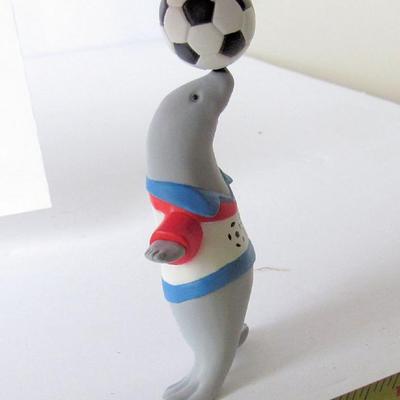 2 Hallmark Christmas Ornaments: Tin Blimp, 1993 and Perfect Balance, 1995