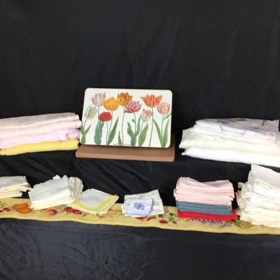 Lot. 6223. Assorted linens, placemats and needlepoint wall hanging