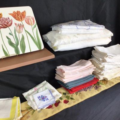 Lot. 6223. Assorted linens, placemats and needlepoint wall hanging