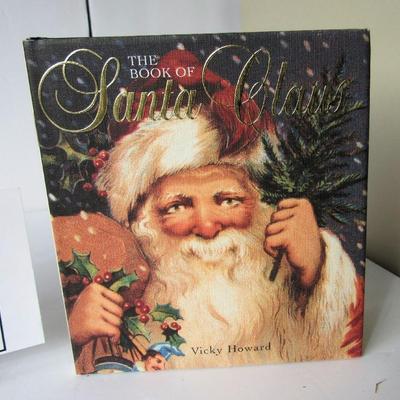 2 Nice Christmas Books: Santa's New Suit Pop Out, 1993 and Book of Santa Claus, 2002