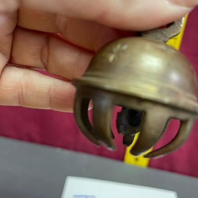 Vintage small brass elephant claw bell
