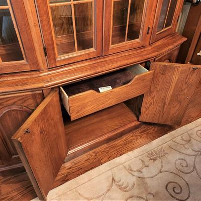 Lot #53  Burkhardt Furniture Lighted China Cabinet