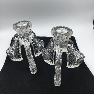 Pair of vintage three leg glass candleholders
