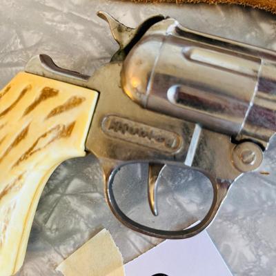 Cap guns in holster