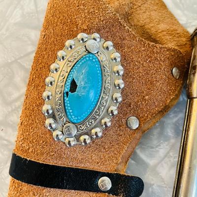 Cap guns in holster