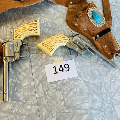 Cap guns in holster