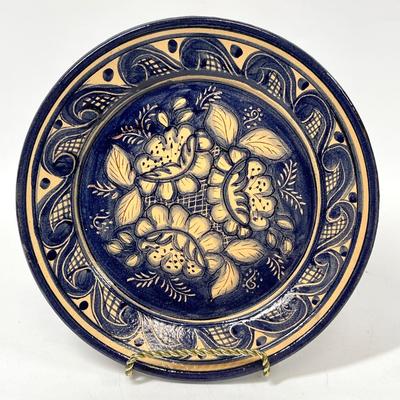 Terra Cotta plate indigo blue and creamy white floral pattern signed by artist