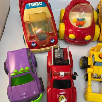 Lot of 8 toy cars trucks and specialty vehicles