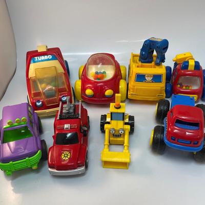Lot of 8 toy cars trucks and specialty vehicles