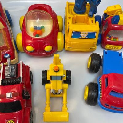 Lot of 8 toy cars trucks and specialty vehicles