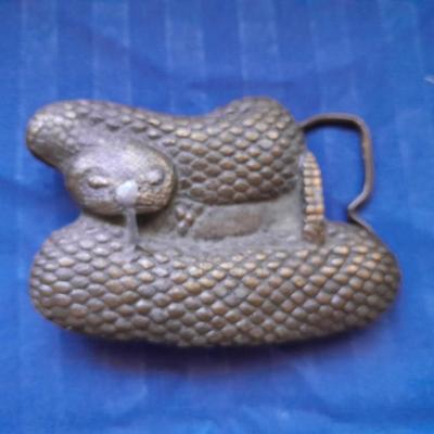LOT 28 MARLBORO BRASS BUCKLE AND RATTLE SNAKE BUCKLE