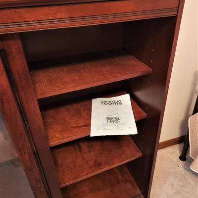 Lot #147  Martha Stewart Sliding Glass Bookcase