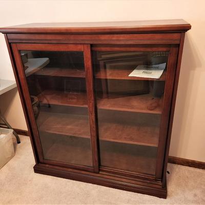 Lot #147  Martha Stewart Sliding Glass Bookcase