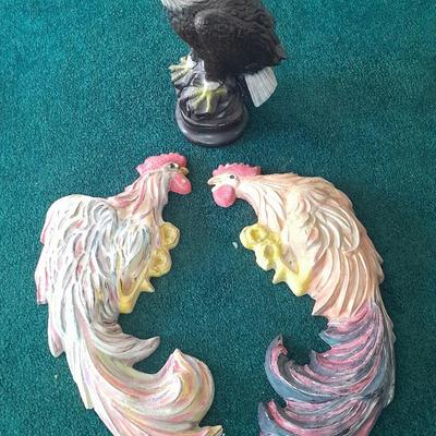 LOT 78 TWO CHALKWARE ROOSTERS, AND AN EAGLE STATUE