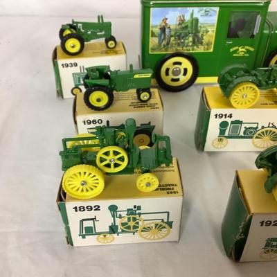 Lot. 6386. John Deer Cast Tractor models and tin