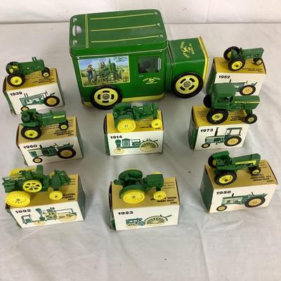 Lot. 6386. John Deer Cast Tractor models and tin