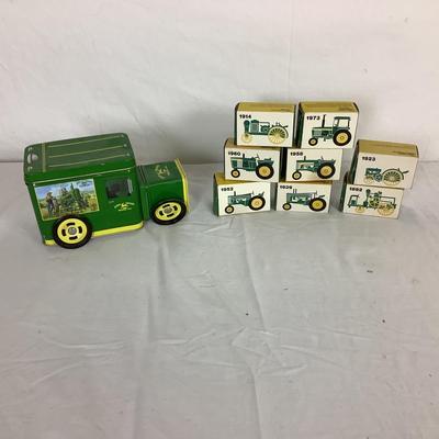 Lot. 6386. John Deer Cast Tractor models and tin
