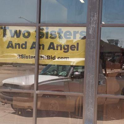 Look for our yellow sign in the window