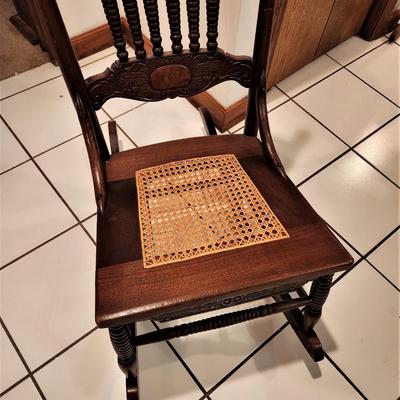Lot #41  Antique Oak Rocker with Caned seat - great condition