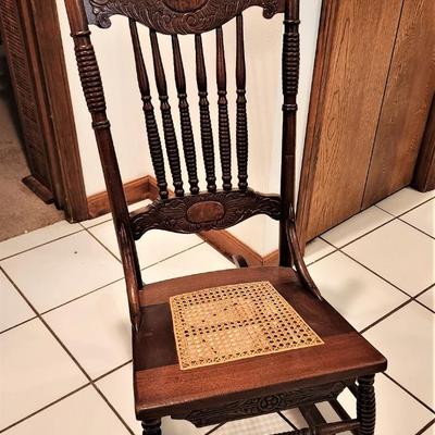 Lot #41  Antique Oak Rocker with Caned seat - great condition