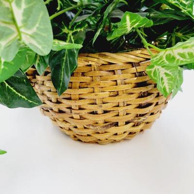 FANTASTIC FAUX PLANT IN NICE WOVEN BASKET