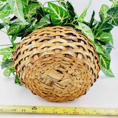 FANTASTIC FAUX PLANT IN NICE WOVEN BASKET