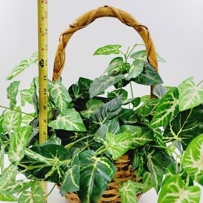 FANTASTIC FAUX PLANT IN NICE WOVEN BASKET