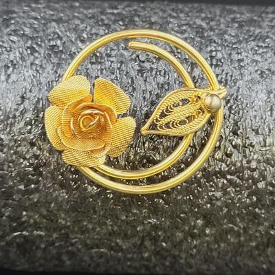 SARAH COVENTRY ROSE GOLD TONED BROOCH