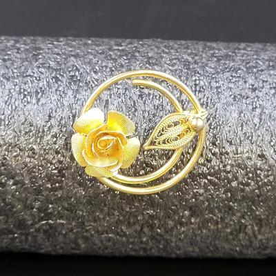SARAH COVENTRY ROSE GOLD TONED BROOCH