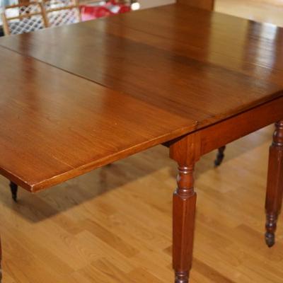 EXCEPTIONAL ANTIQUE LATE 19TH CENTURY BLACK WALNUT THREE BOARD DROP LEAF DINING TABLE.