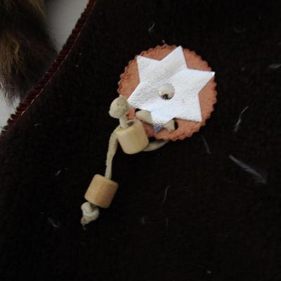 #23 Child's vest, head dress, and pouch