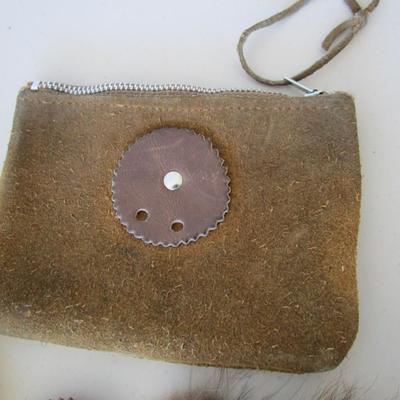 #23 Child's vest, head dress, and pouch