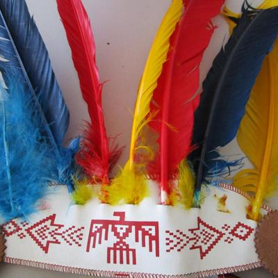 #23 Child's vest, head dress, and pouch