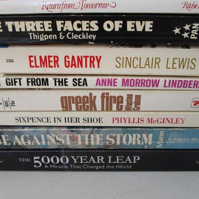 #76 8 Paperback books