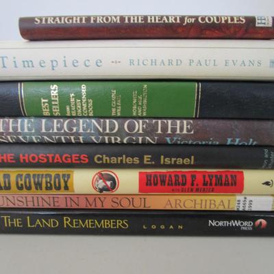 #77 6 hardback books and 2 paperback books