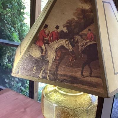 Amber glass oil lamp with equestrian shade