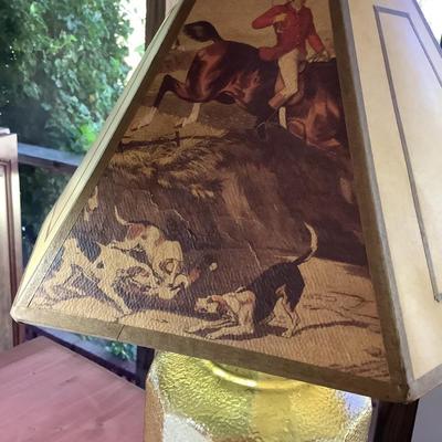 Amber glass oil lamp with equestrian shade
