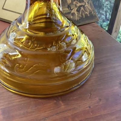 Amber glass oil lamp with equestrian shade