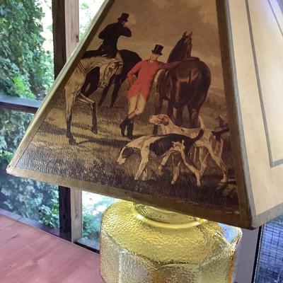 Amber glass oil lamp with equestrian shade