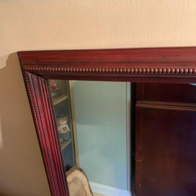 Large wooden framed mirror