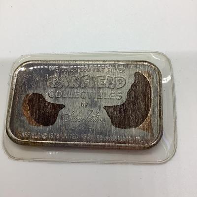 Garfield ingot .999 silver ounce, Donald Duck calculator