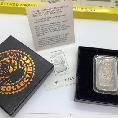 Garfield ingot .999 silver ounce, Donald Duck calculator