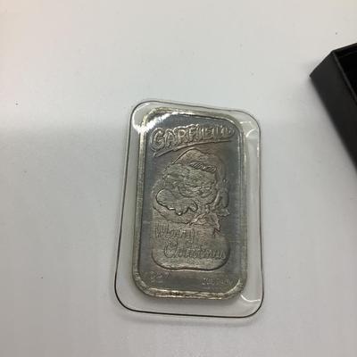 Garfield ingot .999 silver ounce, Donald Duck calculator