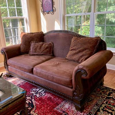 LOT:51G:  Brown Microfiber and Wood Sofa with reversible Cushions