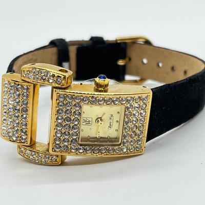 LOT 91: Victoria Weick Beverly Hills Fashion Watch with Velvetized Leather Band (band shedding - needs battery)
