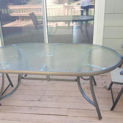 Oval patio table with two chairs 72